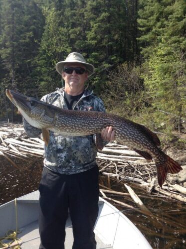 Man in Hat with Large Fish