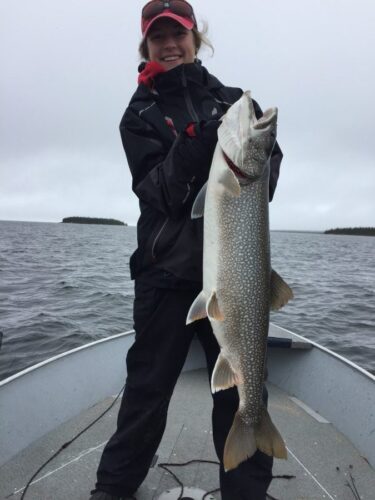 Woman Fishing in Reindeer Lake